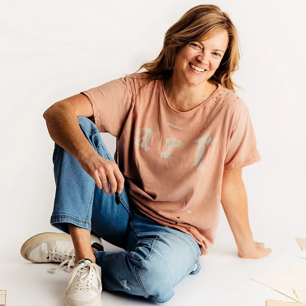 Artist headshot of Caroline Meehean, Wisconsin watercolorist inspired by the Great Lakes.