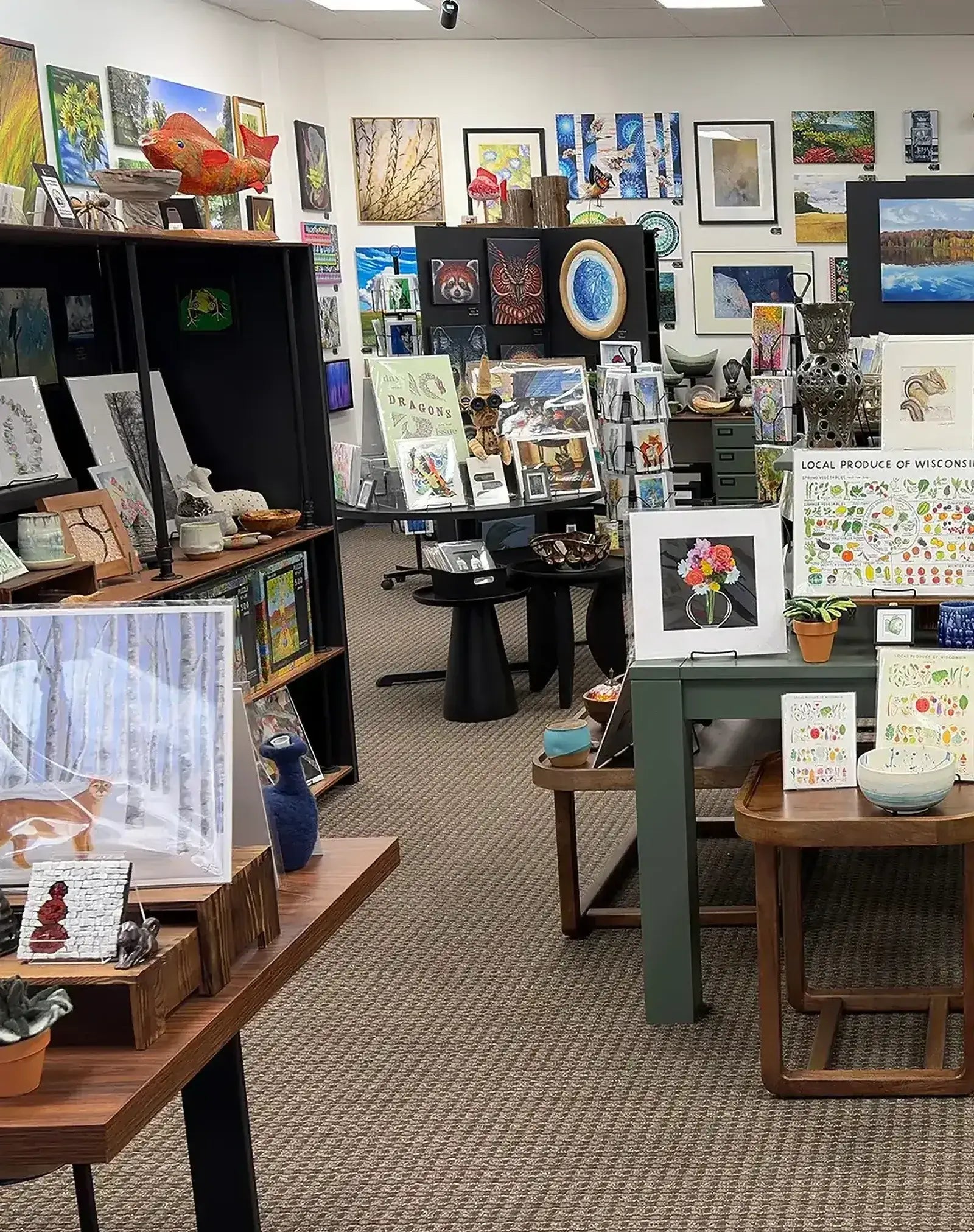 Inside Madison Art Market in Madison, Wisconsin with local artwork, prints, and handmade goods on display.