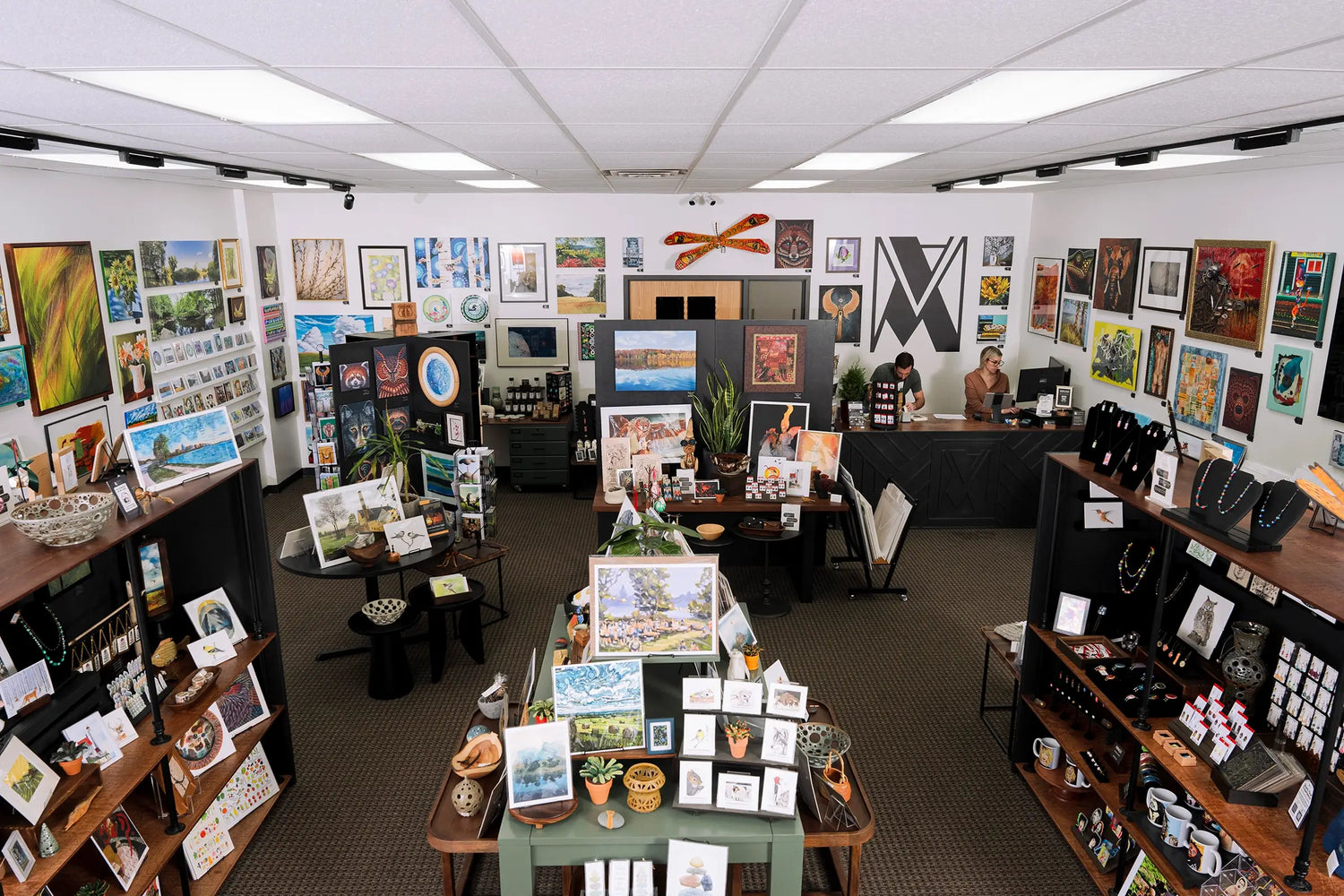 Wide view of Madison Art Market in Madison, Wisconsin with local artwork, prints, jewelry, and gifts on display.